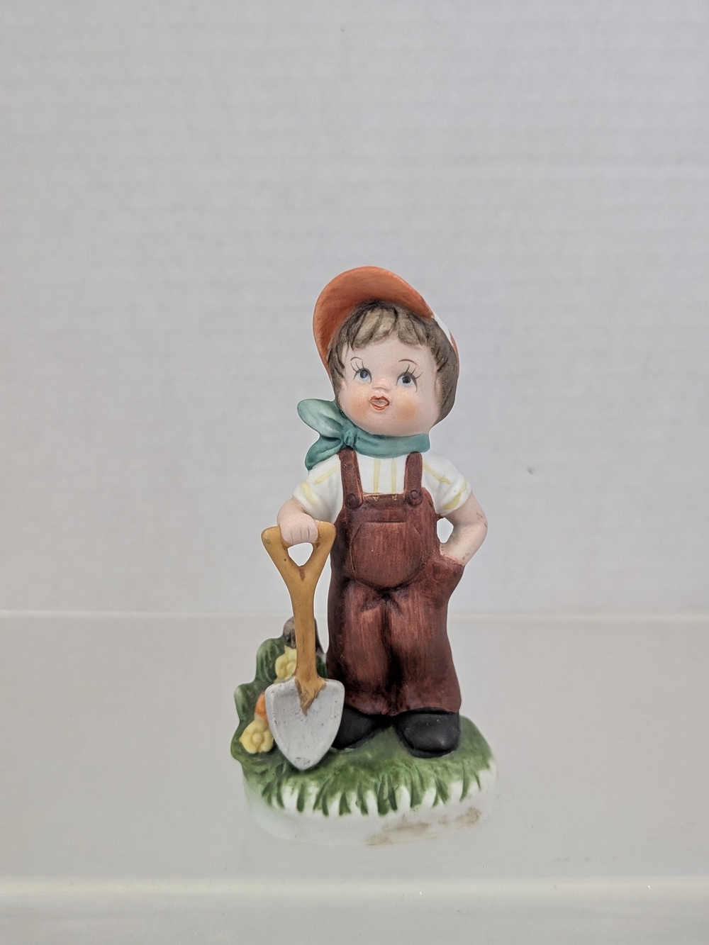 Hand-Painted Garden Boy Figurine - Red Overalls